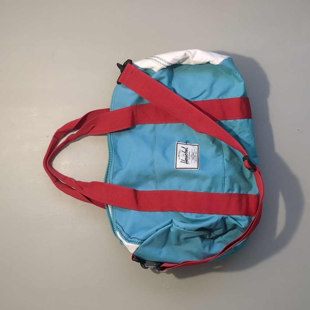 Herschel Color Blocked Duffel Bag Teal And Red Gem